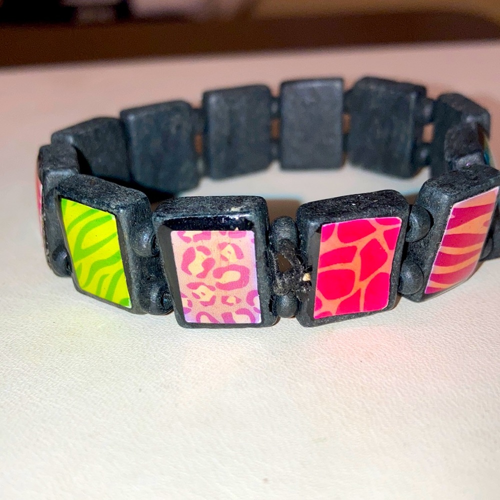 Miulti colored square print bracelet on black background.  Elasticized  bme3068